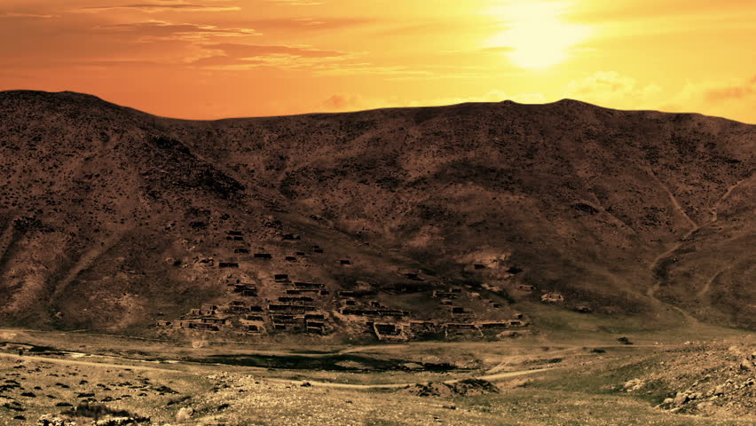 Sunset time lapse zoom out over High Atlas mountains in Morocco