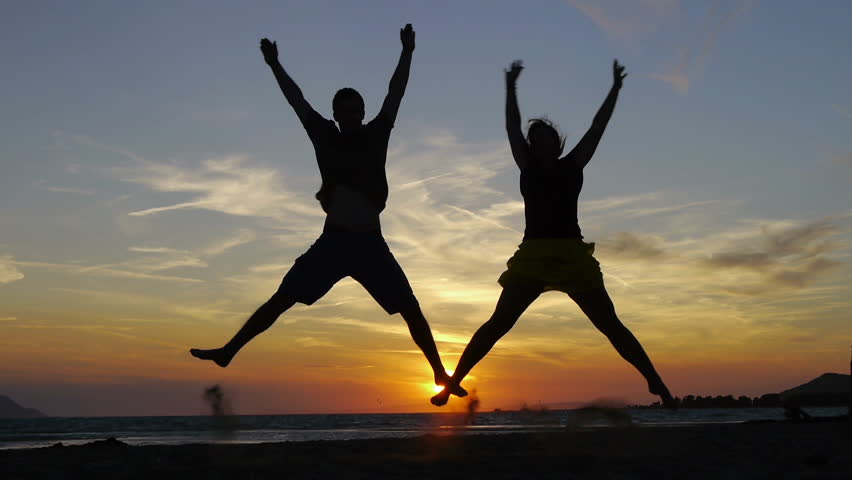 Happy couple jumping