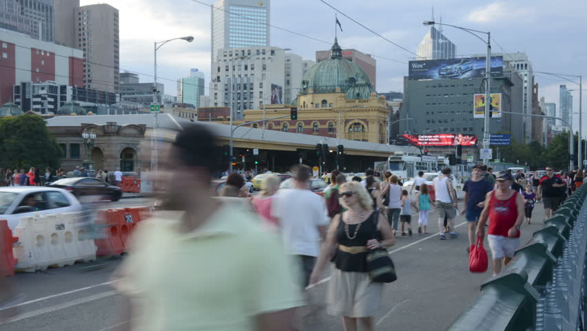 MELBOURNE- MARCH 6: Time lapse of street, people celebration Labour days, Melbourne on March 16, 2013.
