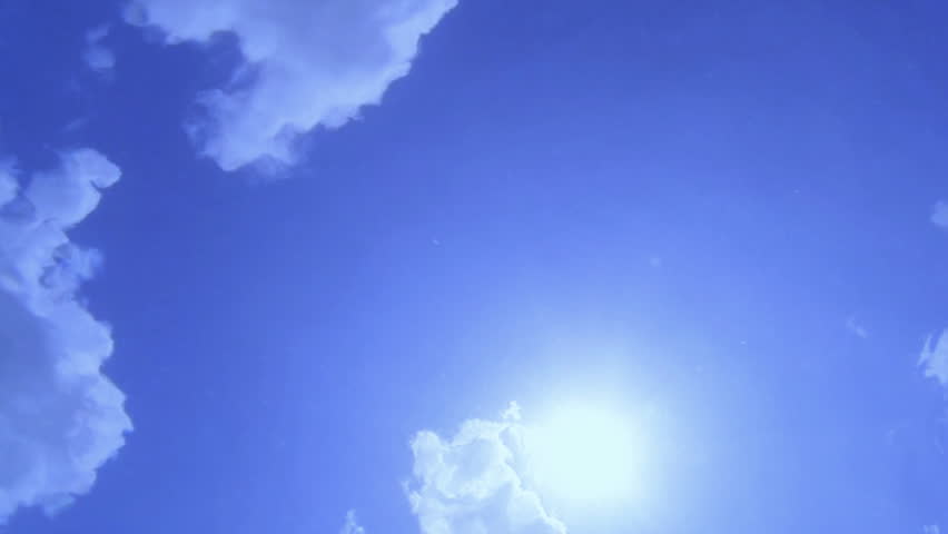 underwater footage of the  sun taken from inside a swimming pool at slow motion