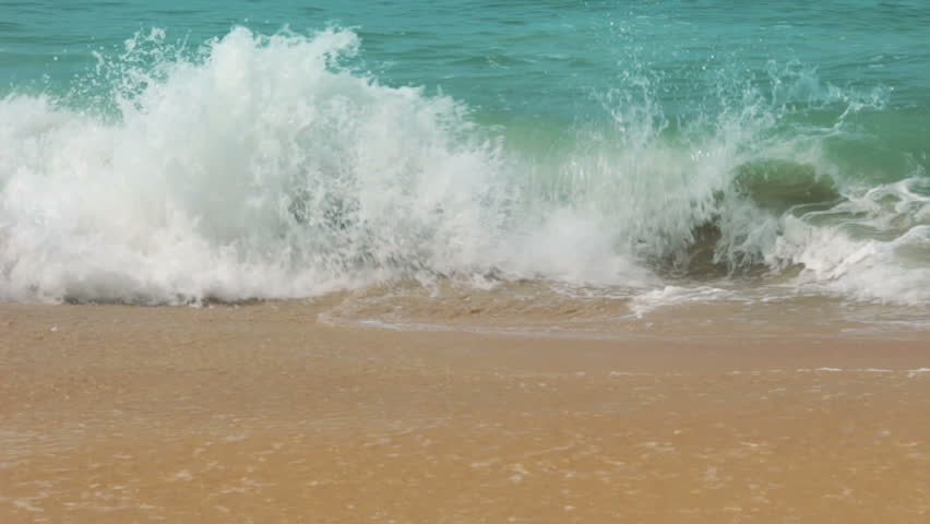 turquoise sea water waves and sand beach