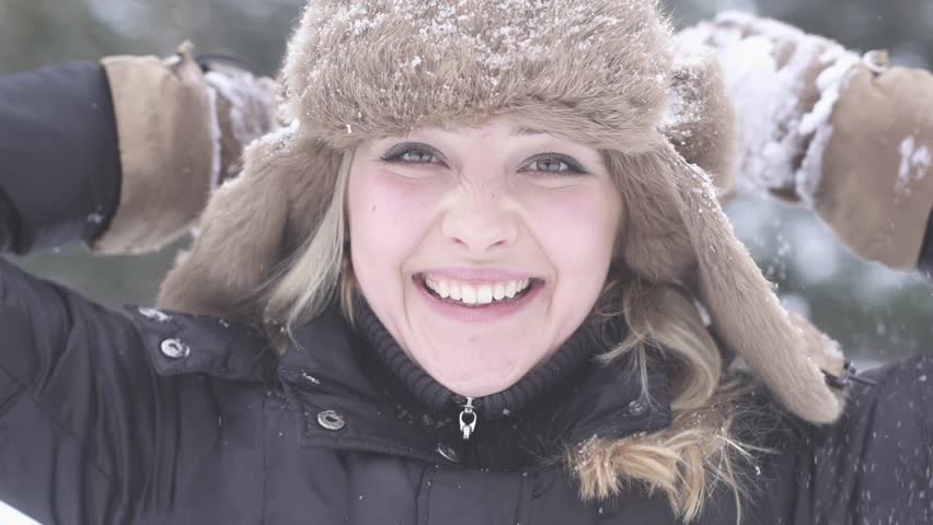 women close up outdoors winter weather snowflakes slow motion 1080 HD