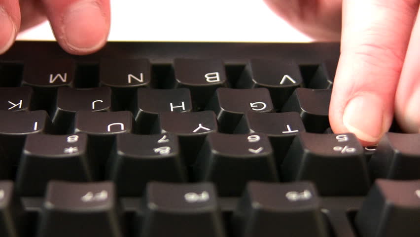 Front view of typing on a keyboard.