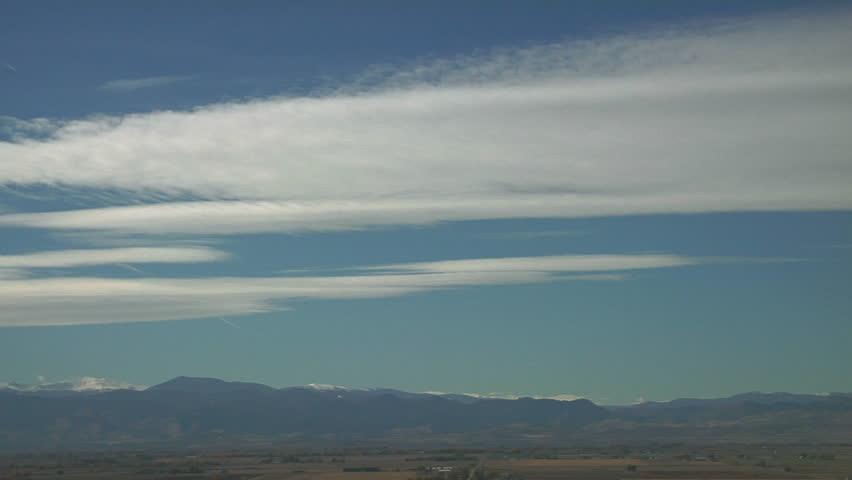Lenticulars. Moisture riding jet stream winds is condensed in classic lenticular clouds