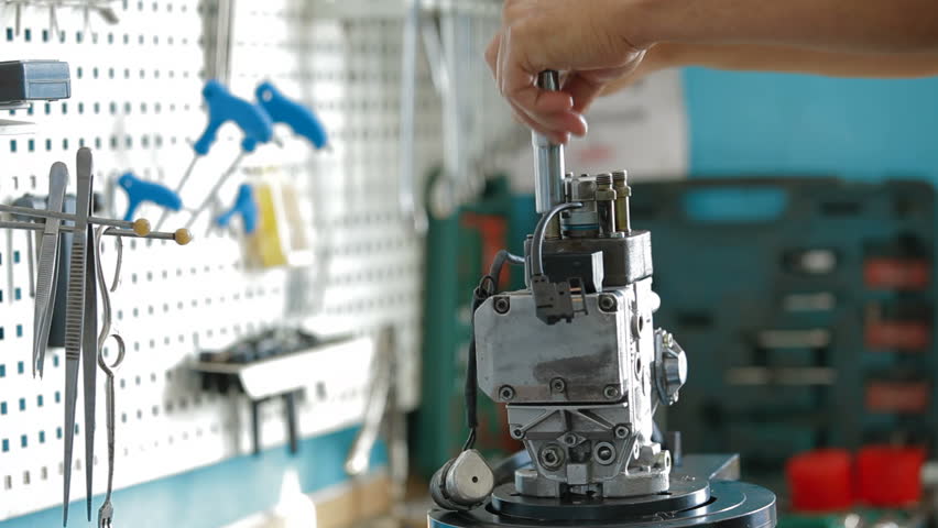 Checking of machine part,close-up. Original sound included.