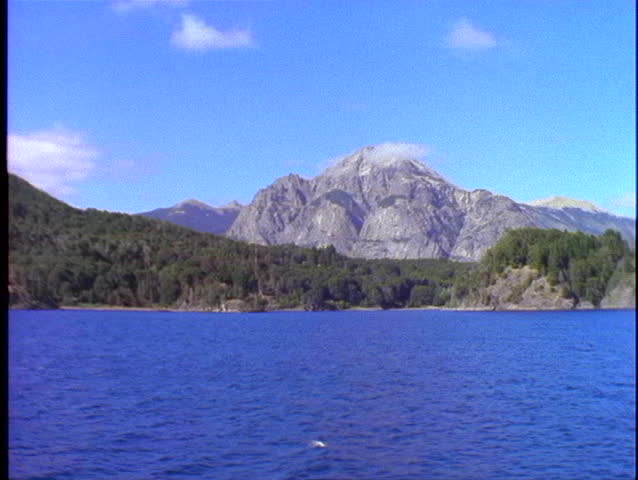 Crossing Andes mountain lake, POV from boat, Argentina