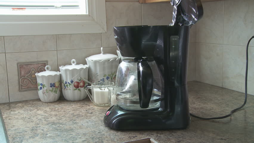 Turning On Coffee Machine
