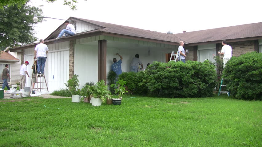 Video of a church group painting a neighbors house. Volunteer in the city. Painting a home for a single mom. Don Despain of Rekindle Photo