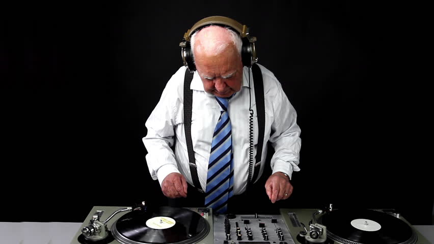 a very funky elderly grandpa dj mixing records

