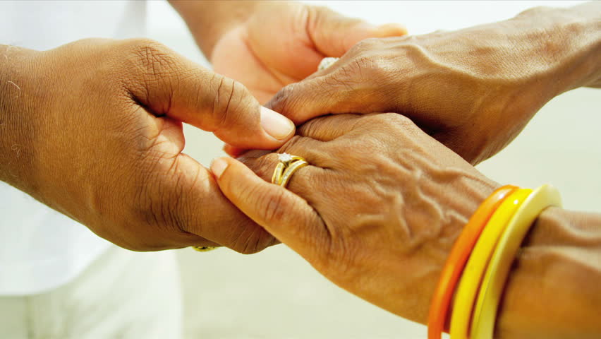 Elderly African American Couple Holding Hands Outdoors Close Up Hands