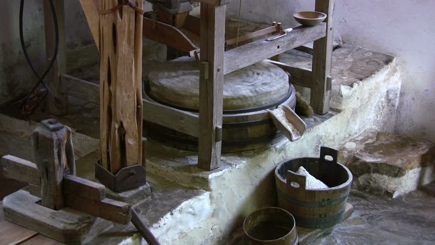 Video of grist mill grinding stones of old Spanish at Mission San Jose San Antonio, Texas.  Closeup view. Water powered wheel. Flour mill for pioneers and indians. Don Despain of Rekindle Photo.