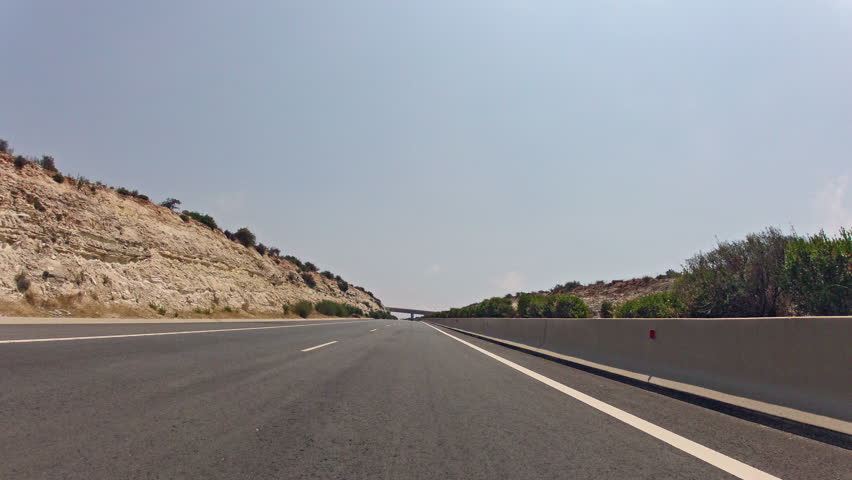 Fast driving on Cyprus highway through tunnel time-lapse