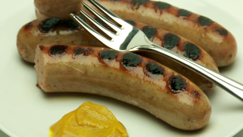 broiled bratwurst sausages rotate	