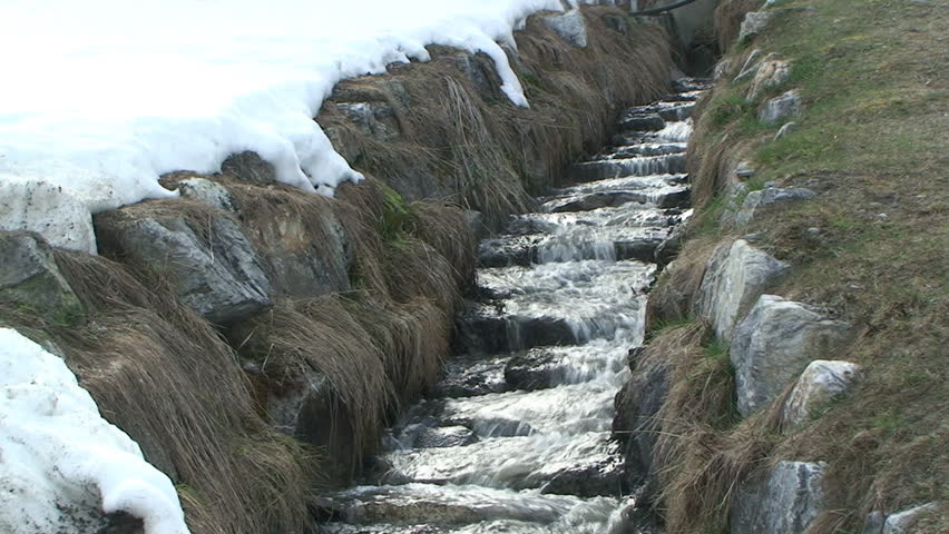 Mountain Stream with Melting Snow
