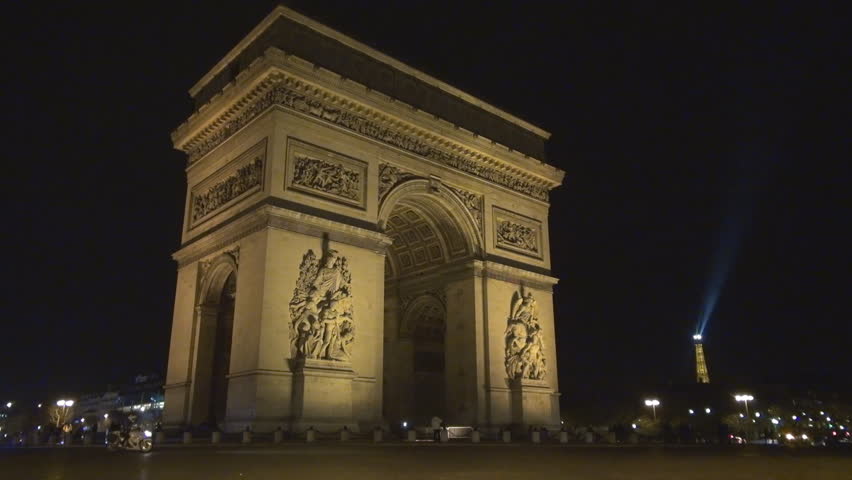 PARIS, FRANCE - DECEMBER 25, 2011, Traffic car and The Arc de Triomphe in Paris by night