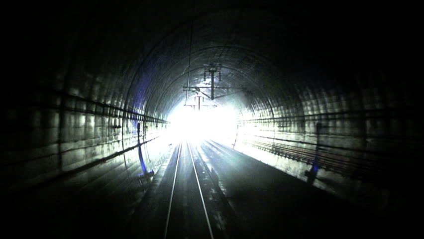 Coming out of the dark - Train engineer's perspective while exiting the longest rail tunnel in the World - the Seikan Tunnel which extends 33.5 miles under the Tsugara Strait. 