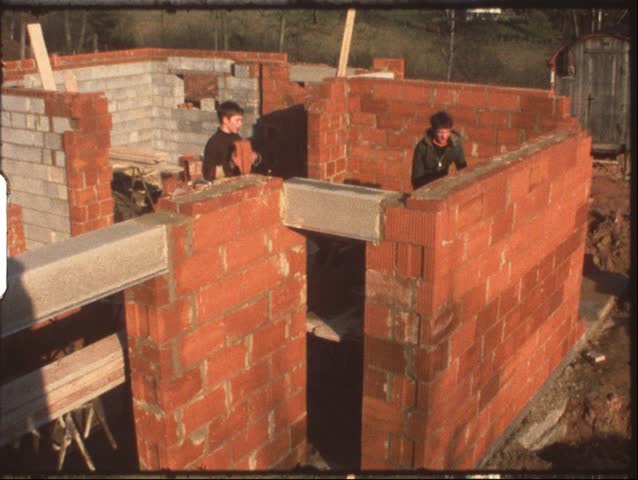 Vintage 8mm film: Housebuilding, children laying bricks