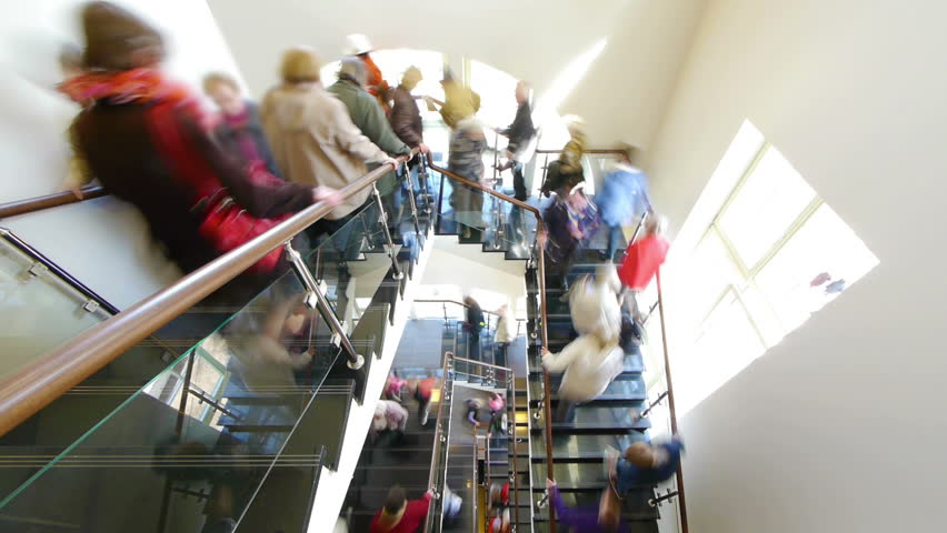 HD - Flow of people on the stairs blurred timelapse