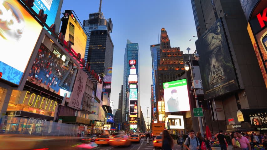 NEW YORK CITY - APRIL 9: Pedestrians and traffic in Times Square April 9, 2013 in New York, NY. Times square is one of the world's most popular attractions with nearly 40 million  visitors annually.