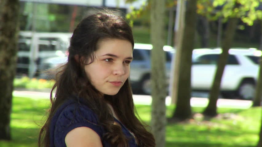 Close up shot of young caucasian teenage girl feeling sad disturbed and depressed through a series of facial expressions and emotions
