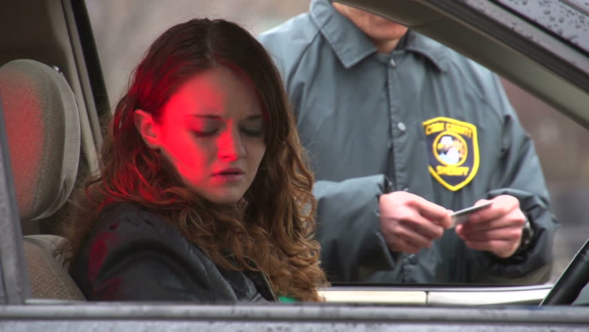 Teen girl gets upset with police officer