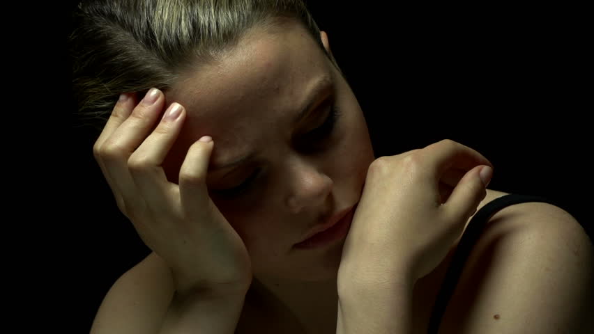 Woman in a statuesque pose in color. Experimental lighting