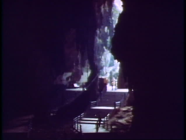 The Batu Caves of Kuala Lumpar, a Hindu shrine, stalactites from the open roof