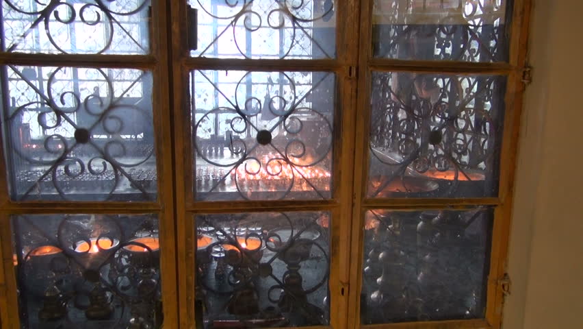 Tibetan buddhist candles in Dharamsala Tsuglagkhang temple, India