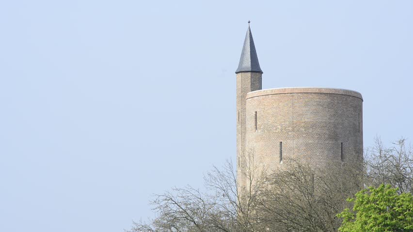 Water tower and canal near Gentpoort in Bruges, Belgium