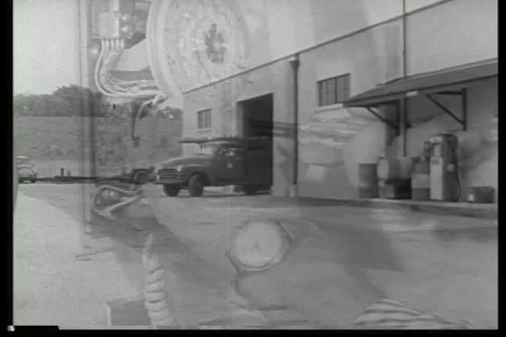 1940s - Archival black and white film describing construction of the nation's telephone system.