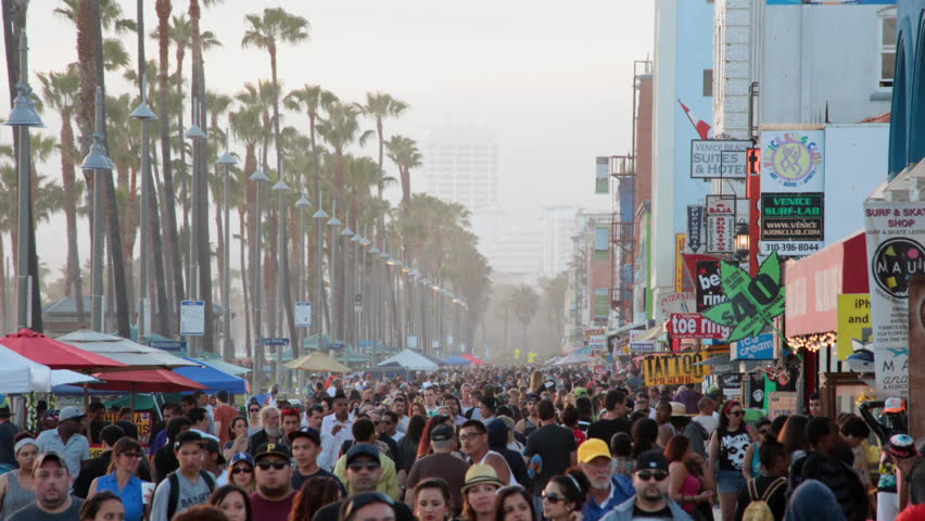VENICE BEACH, California MAY 19:  A Time lapse of thousands of tourists enjoying the Venice  Beach Boardwalk .  This most famous visited tourist destination  May 19, 2013 in Venice Beach California