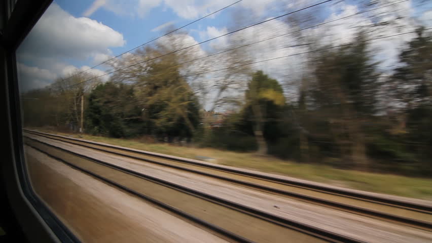 Train travel UK. Arched bridge.
Travelling by train. Going underneath an arched bridge. London, UK. 

