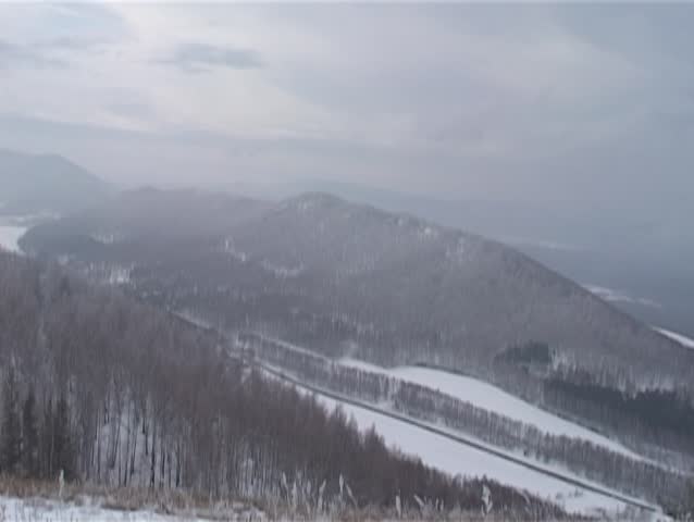 Nature of the South Ural of Russia. View of mountains and forests, clouds flying