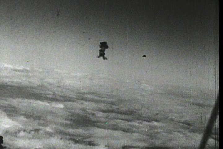 1940s - Air Force bombers fly bombing runs over Nazi Germany during World War Two (bad audio).