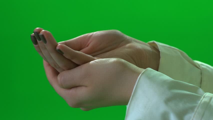 hands of women isolated against green screen