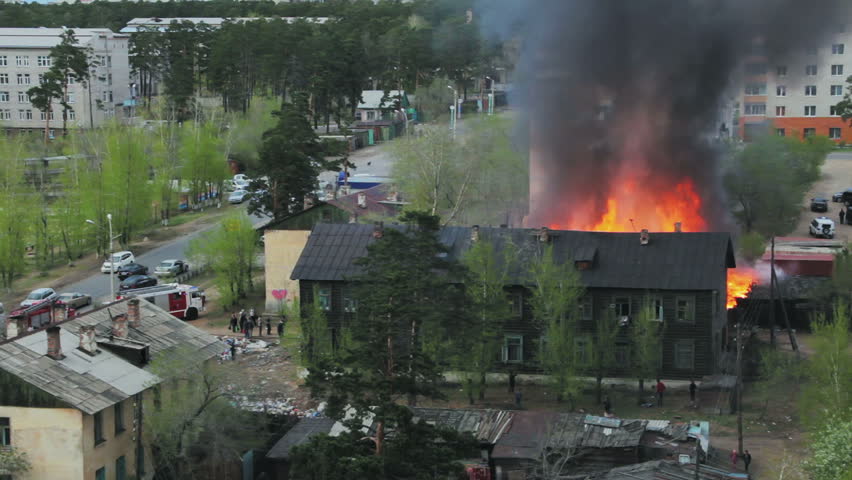 Wooden residential house in fire. Russia