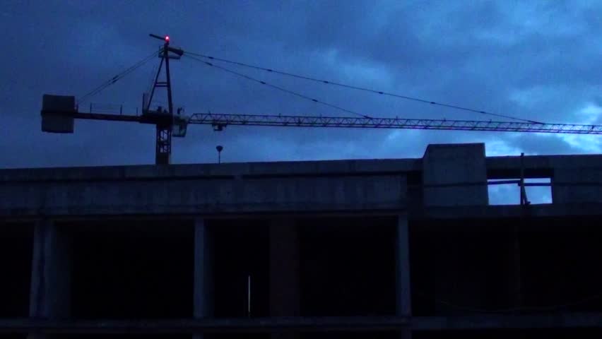 Construction site and crane at early morning, audio