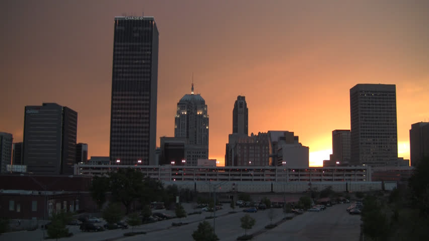 Downtown Oklahoma City, OK with Sunset and Train.