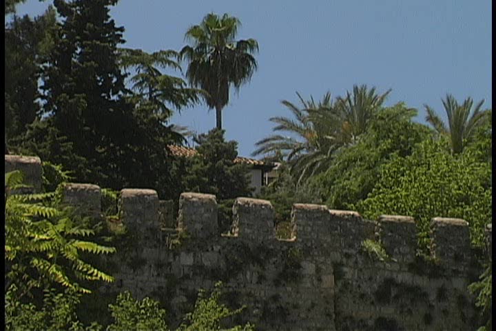 Closeup of a Medieval Selcuk defense wall with crenelations and loopholes in perfect conditions