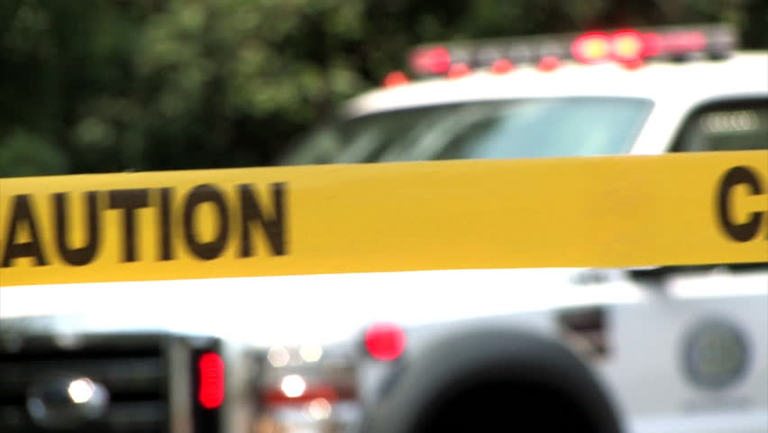 Caution tape at an accident scene.