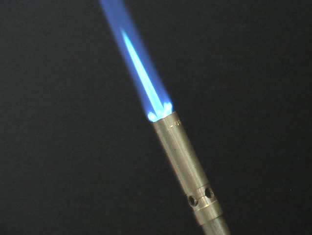 Burning propane torch