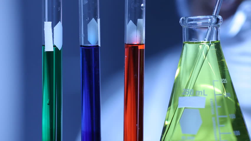 Scientist mixing liquids