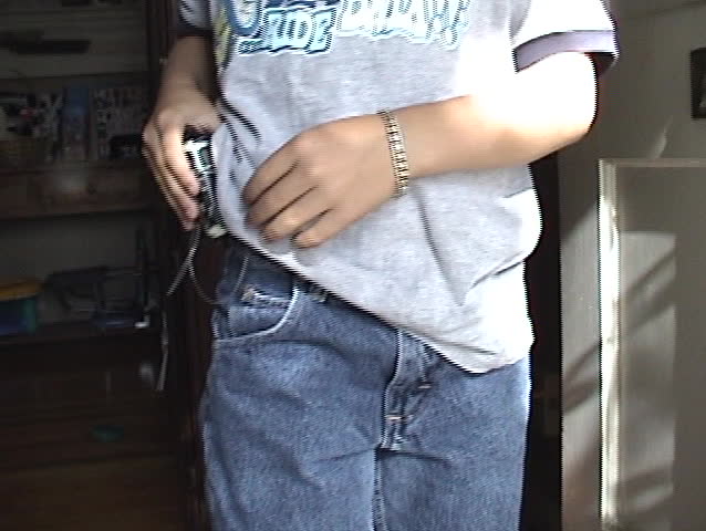 A Juvenile Diabetic Handling his Insulin Pump
