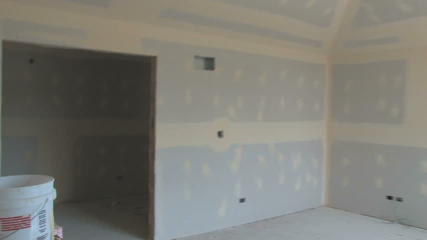 Smooth walk-through of a luxury house under construction. Shot using stabilizing Glidecam.  