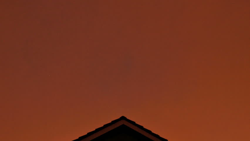 By setting a constant white balance setting in a time lapse shot, an interesting effect had been achieved - the color of clouds constantly changes, because the Sun is rising.