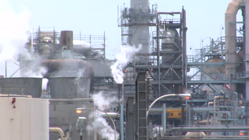 This is an industrial, refinery establishing shot
