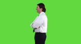 Young businessman turning towards camera - green screen version