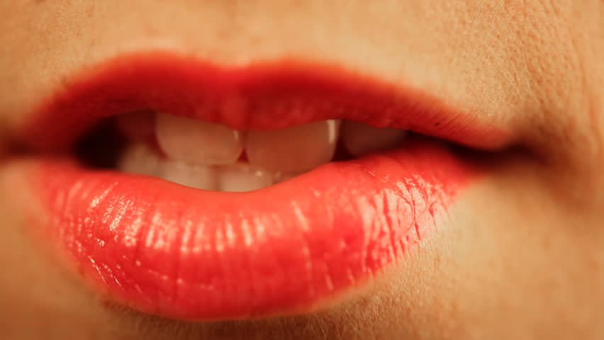 Sensual red lips of young woman