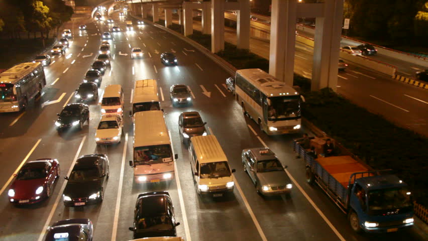 time-lapse video of traffic at an intersection in shanghai china.