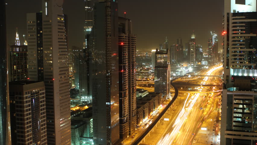 time lapse of busy streets and skyscrapers in dubai city
